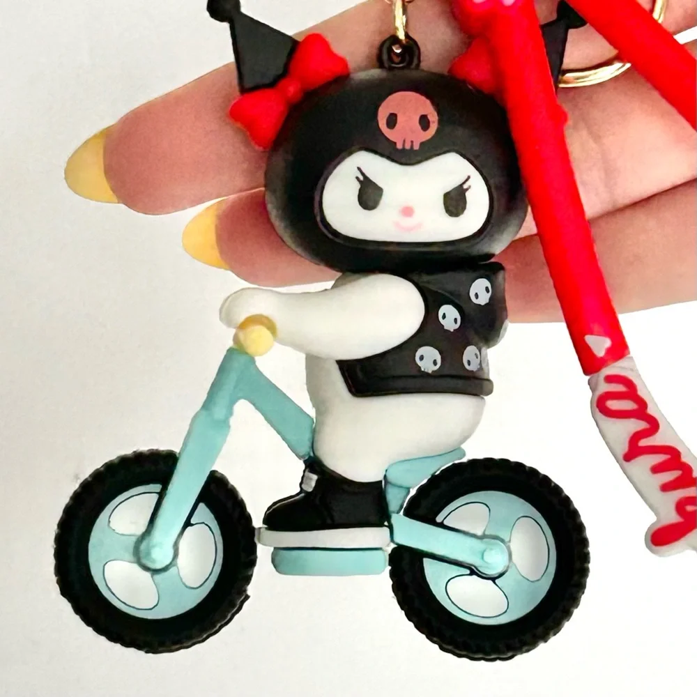 💜Kuromi Riding on Bicycle Adorable Keychain Backpack Accessory